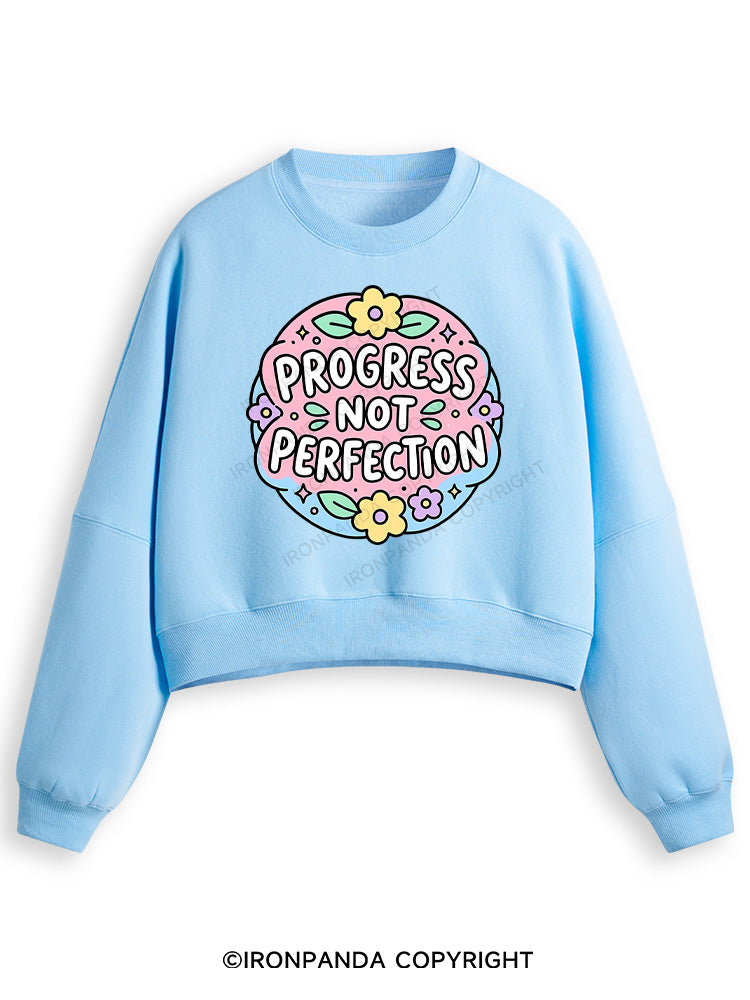 PROGRESS NOT PERFECTION Fleece Crop Sweatshirt