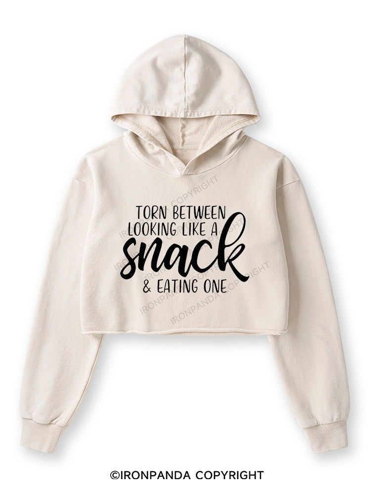 TORN BETWEEN A SNACK AND EAT ONE Washed Crop Hoodie