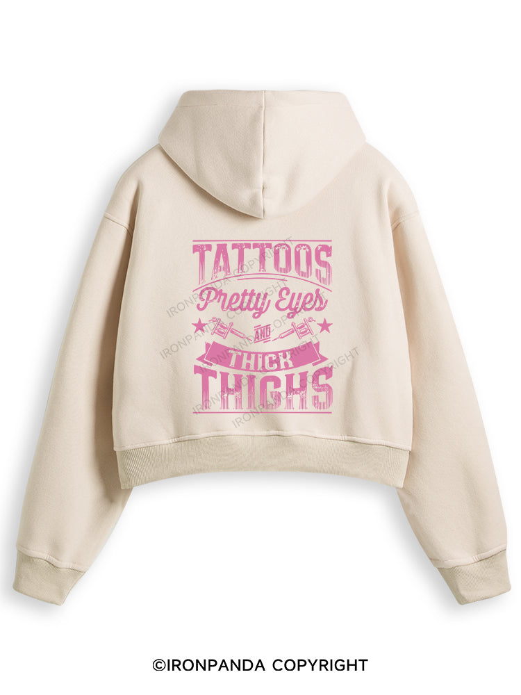 TATTOOS PRETTY EYES AND THICK THIGHS Fleece Crop Zip Up Hoodie
