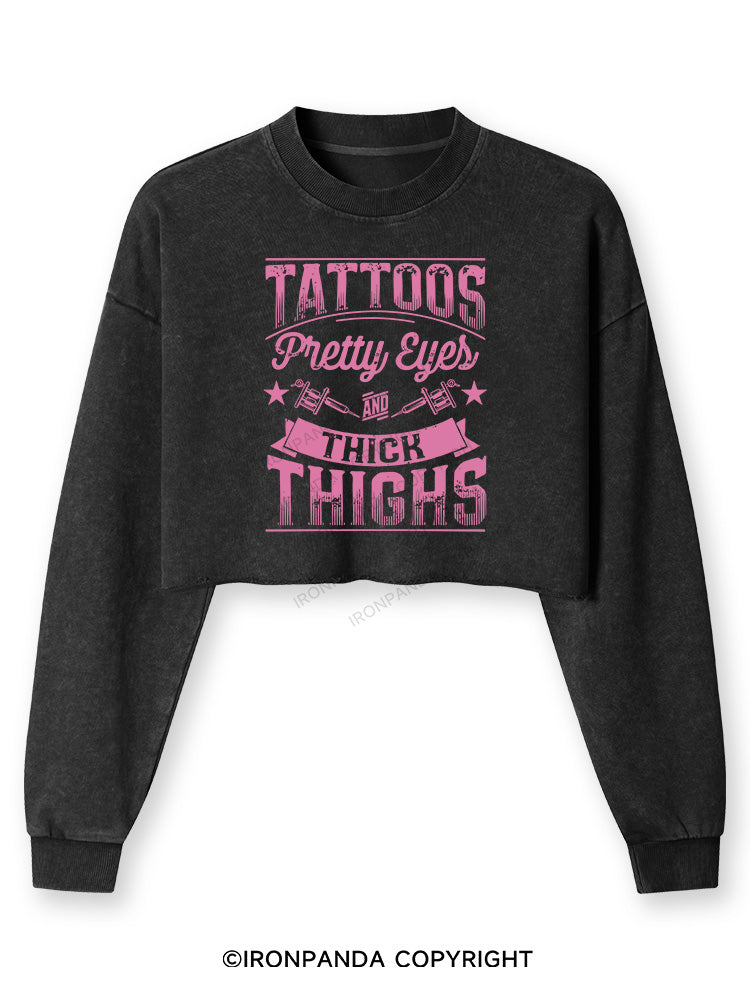 TATTOOS PRETTY EYES AND THICK THIGHS Washed Long-Sleeve Crop Top
