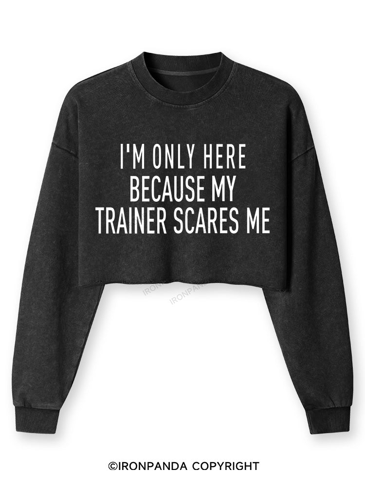 I'M ONLY HERE BECAUSE MY TRAINER SCARES ME Washed Long-Sleeve Crop Top