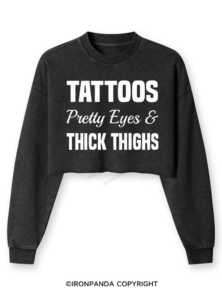 TATTOOS PRETTY EYES AND THICK THIGHS Washed Long-Sleeve Crop Top