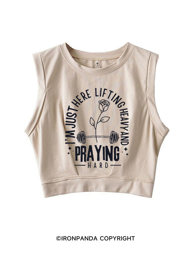 I'M JUST HERE LIFTING HEAVY AND PRAYING HARD SLEEVELESS CROP TOPS