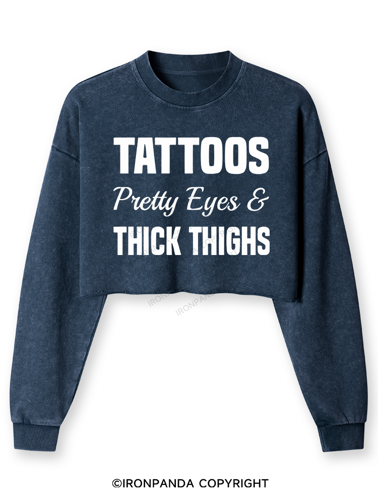 TATTOOS PRETTY EYES AND THICK THIGHS Washed Long-Sleeve Crop Top
