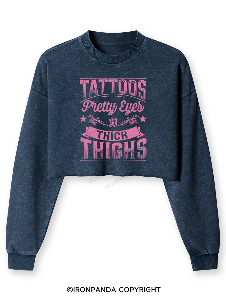 TATTOOS PRETTY EYES AND THICK THIGHS Washed Long-Sleeve Crop Top