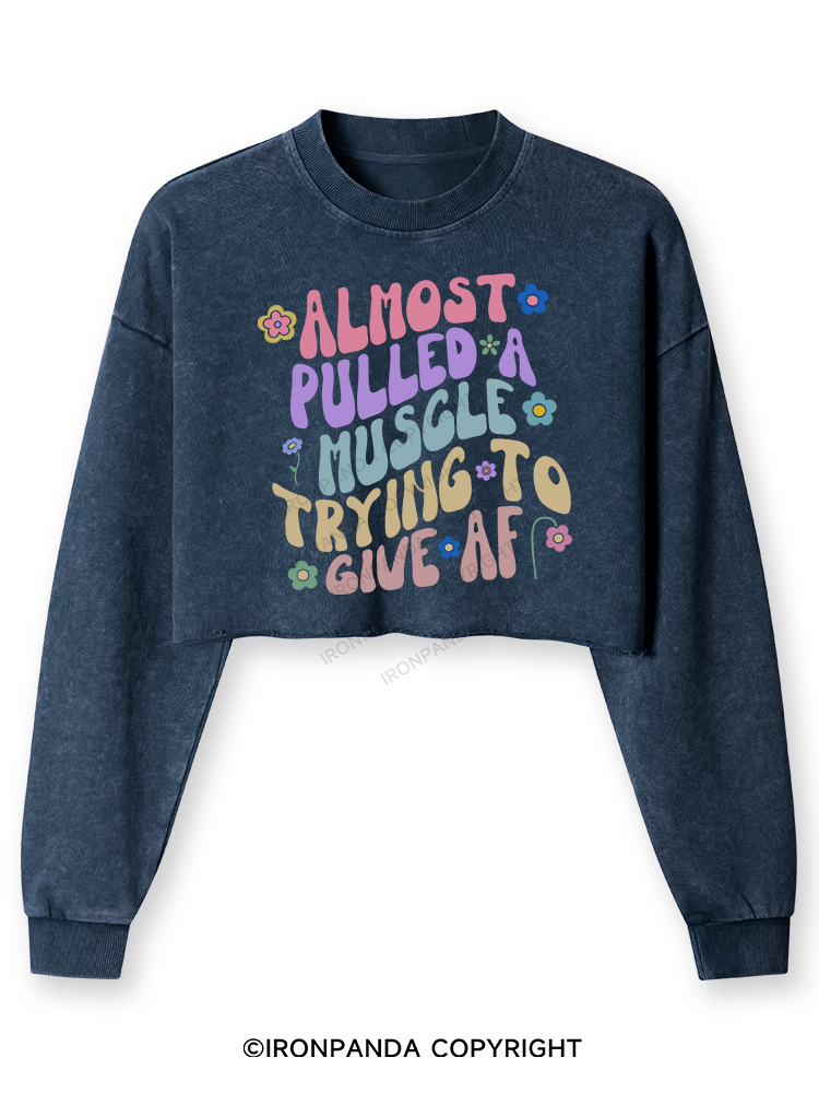 ALMOST PULLED A MUSCLE TRYING TO GIVE AF Washed Long-Sleeve Crop Top