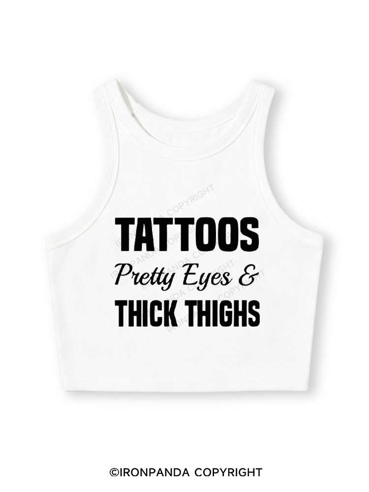 TATTOOS PRETTY EYES AND THICK THIGHS Fitted Crop Tank Top