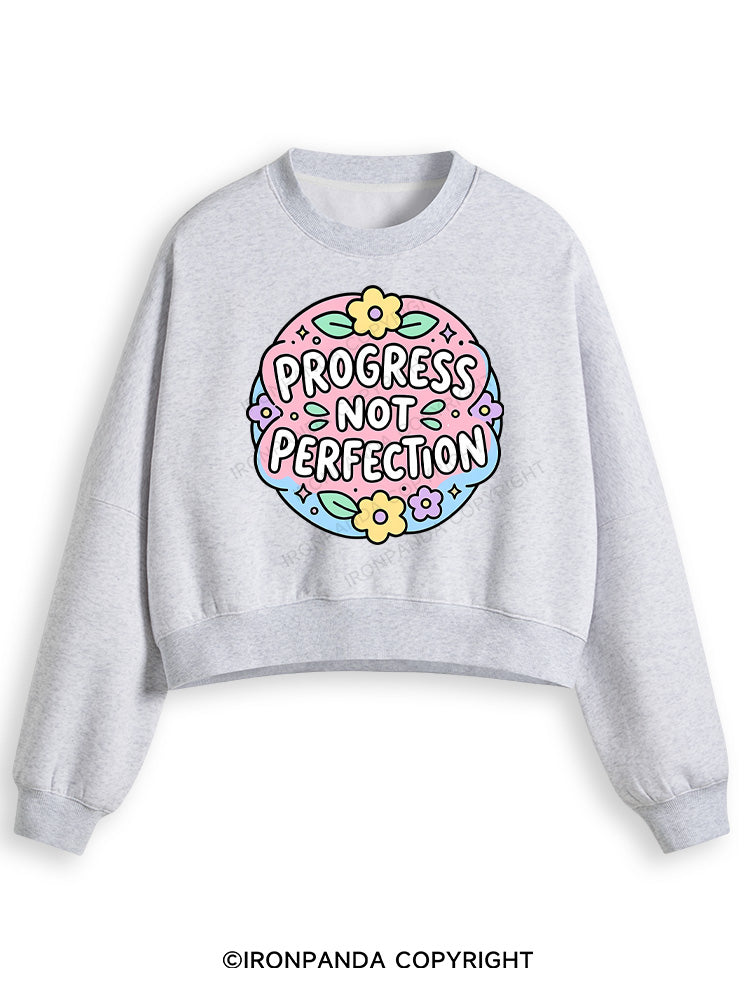 PROGRESS NOT PERFECTION Fleece Crop Sweatshirt