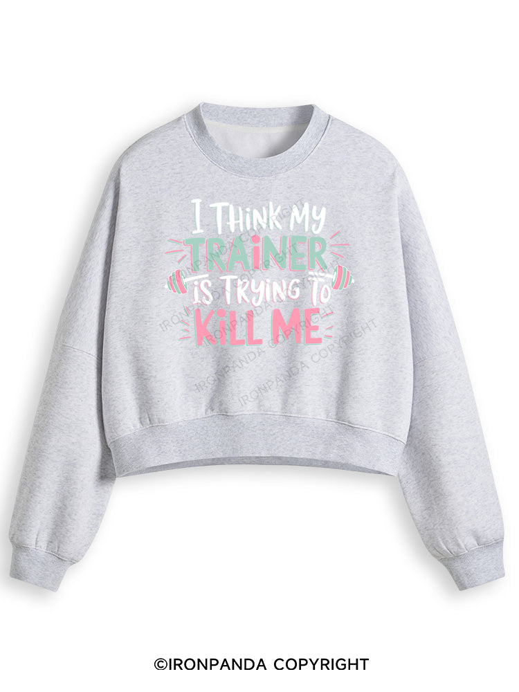 I THINK MY TRAINER IS TRYING TO KILL ME  Fleece Crop Sweatshirt