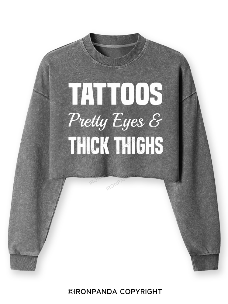 TATTOOS PRETTY EYES AND THICK THIGHS Washed Long-Sleeve Crop Top