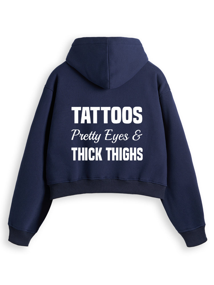 TATTOOS PRETTY EYES AND THICK THIGHS Fleece Crop Zip Up Hoodie