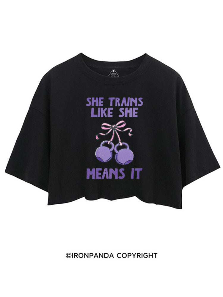 SHE TRAINS LIKE SHE MEANS IT CROP TOPS