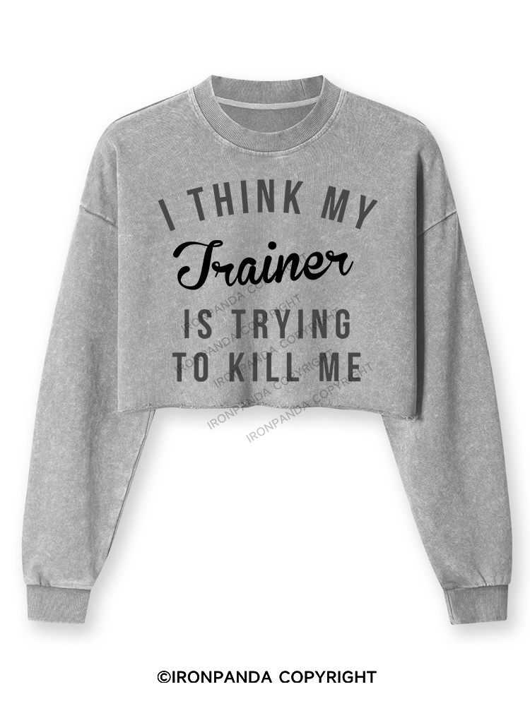 I THINK MY TRAINER IS TRYING TO KILL ME Washed Long-Sleeve Crop Top