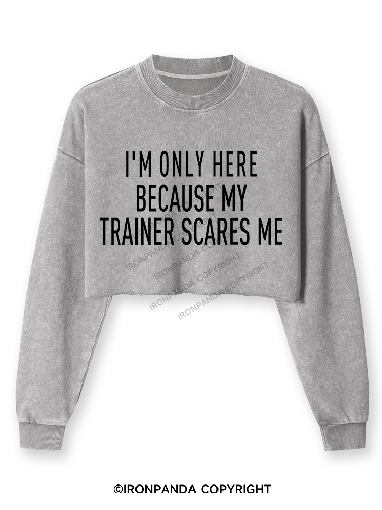 I'M ONLY HERE BECAUSE MY TRAINER SCARES ME Washed Long-Sleeve Crop Top
