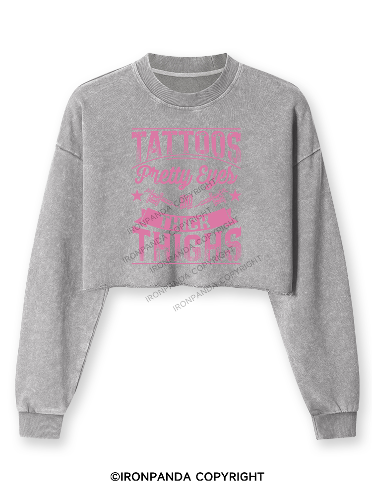 TATTOOS PRETTY EYES AND THICK THIGHS Washed Long-Sleeve Crop Top