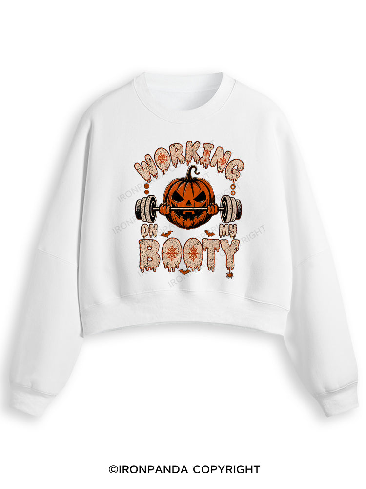 WORKING ON MY BOOTY FUNNY HALLOWEEN PUMPKIN Fleece Crop Sweatshirt