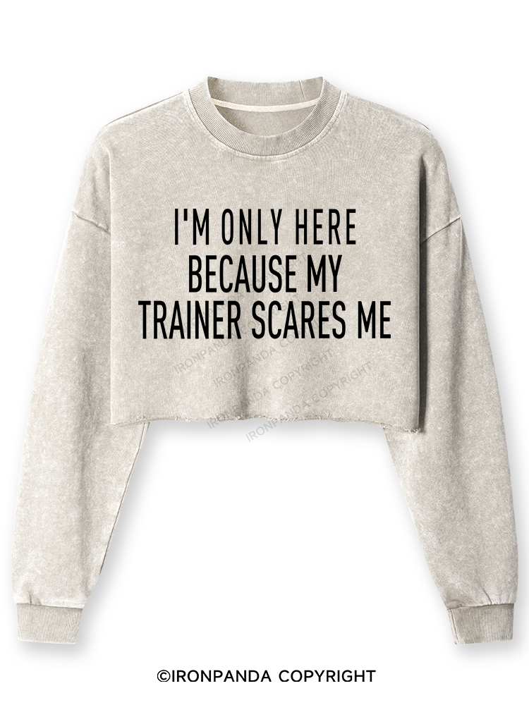 I'M ONLY HERE BECAUSE MY TRAINER SCARES ME Washed Long-Sleeve Crop Top