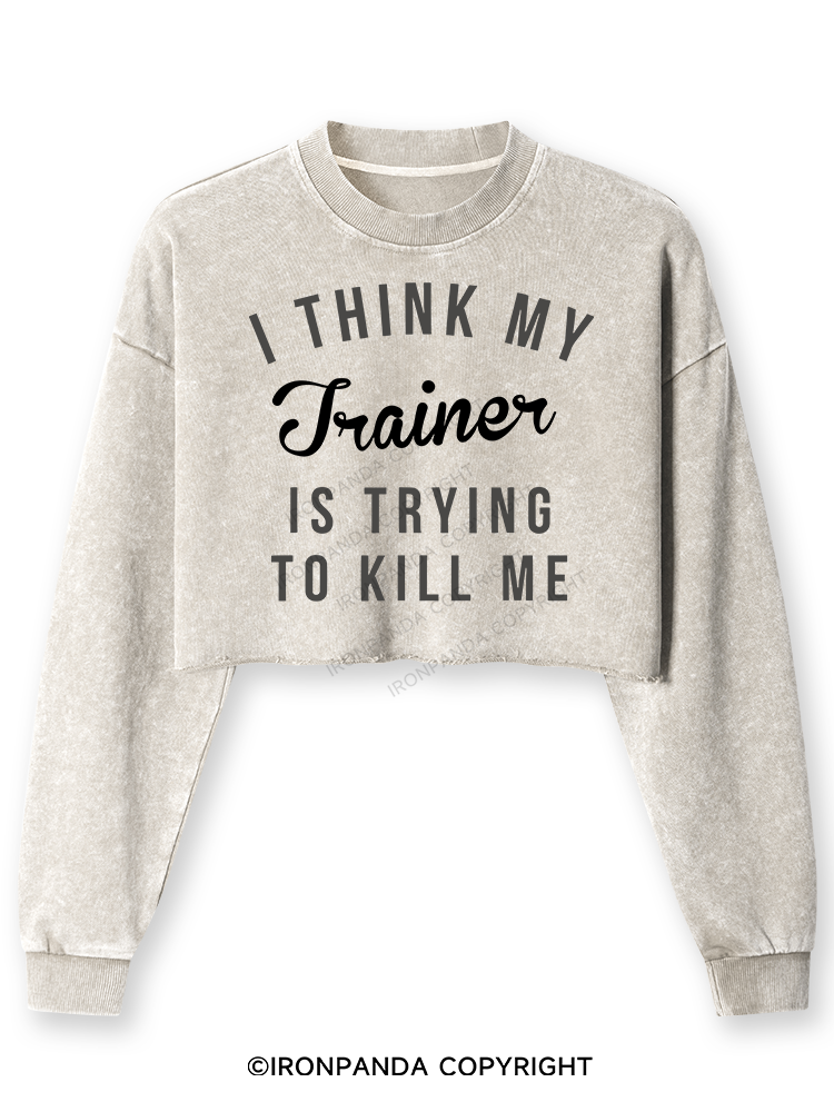 I THINK MY TRAINER IS TRYING TO KILL ME Washed Long-Sleeve Crop Top