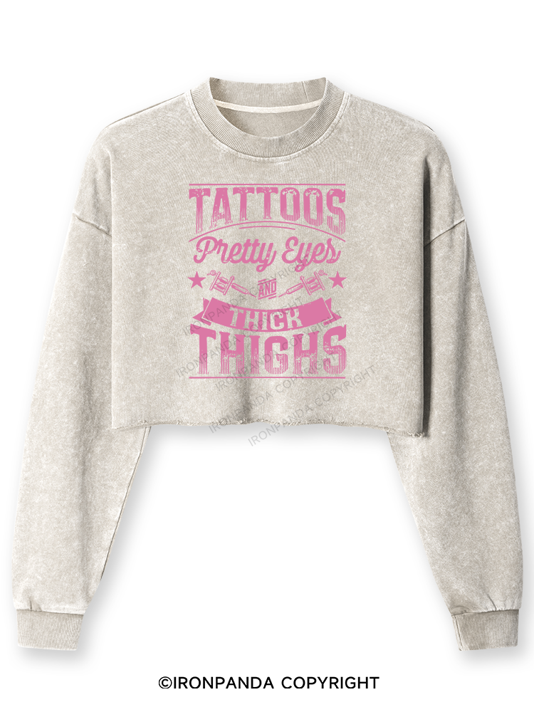 TATTOOS PRETTY EYES AND THICK THIGHS Washed Long-Sleeve Crop Top