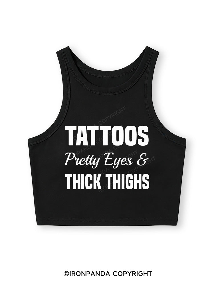 TATTOOS PRETTY EYES AND THICK THIGHS Fitted Crop Tank Top