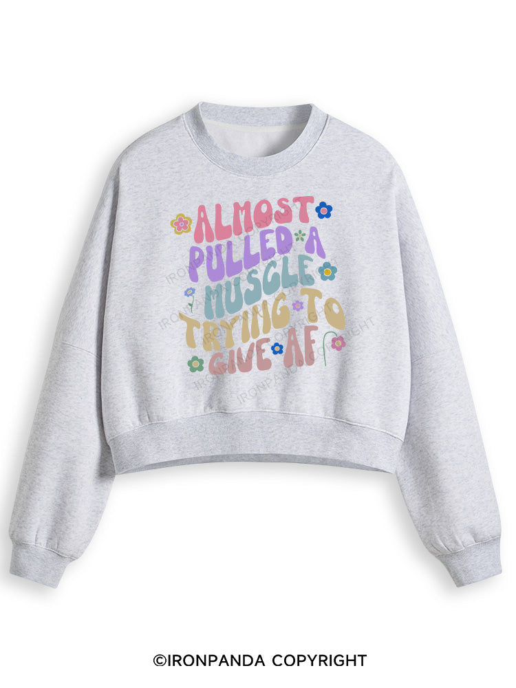 ALMOST PULLED A MUSCLE TRYING TO GIVE AF Fleece Crop Sweatshirt