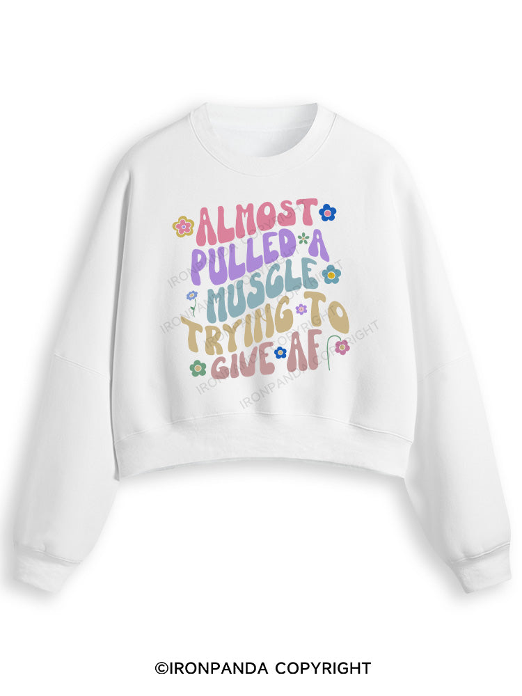 ALMOST PULLED A MUSCLE TRYING TO GIVE AF Fleece Crop Sweatshirt