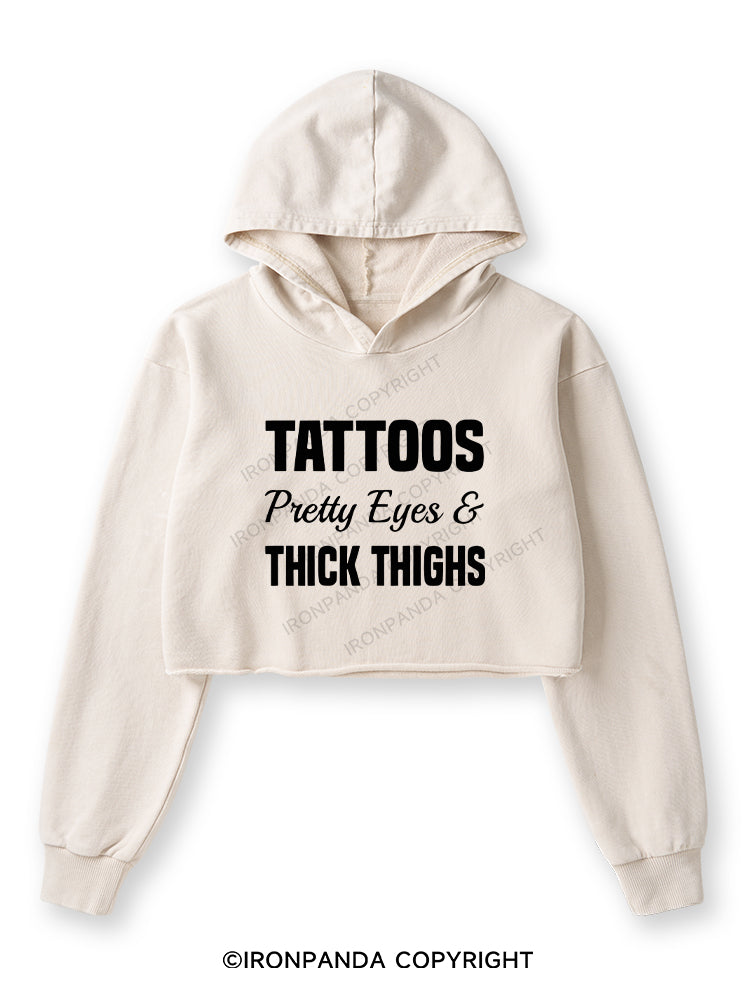 TATTOOS PRETTY EYES AND THICK THIGHS Washed Crop Hoodie