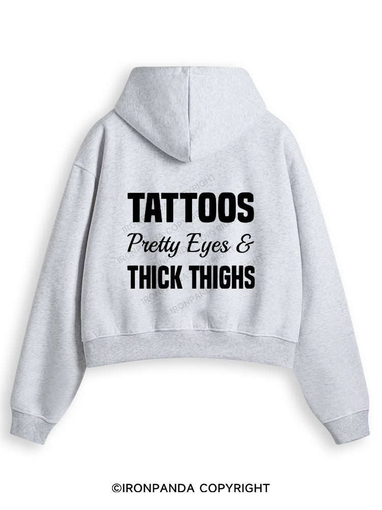 TATTOOS PRETTY EYES AND THICK THIGHS Fleece Crop Zip Up Hoodie