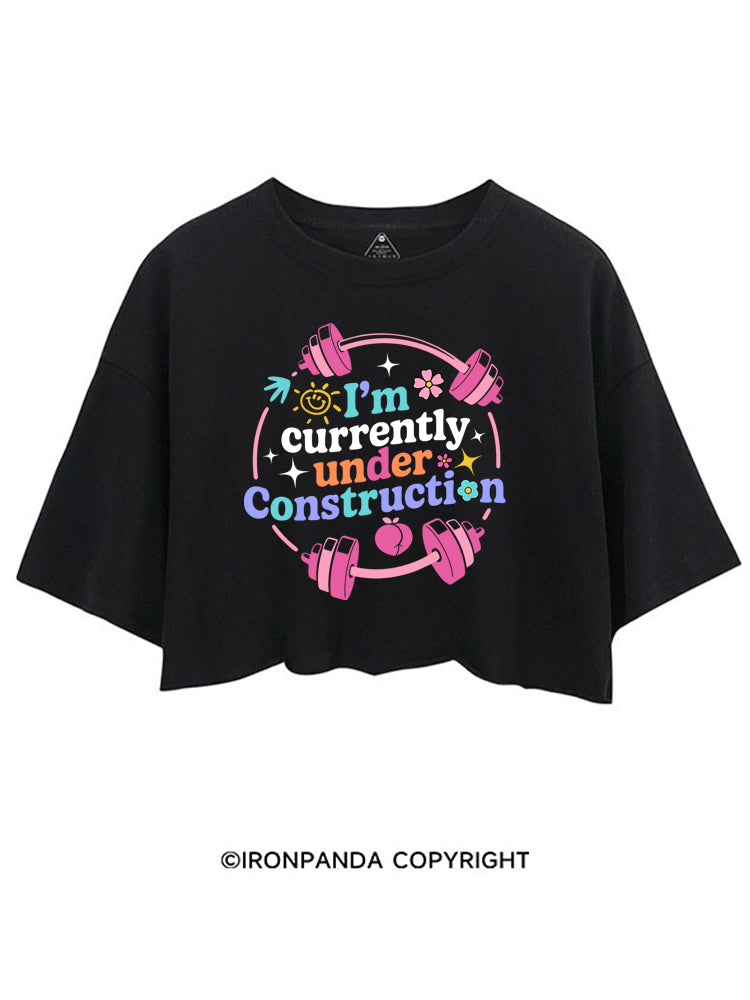 I'M CURRENTLY UNDER CONSTRUCTION CROP TOPS