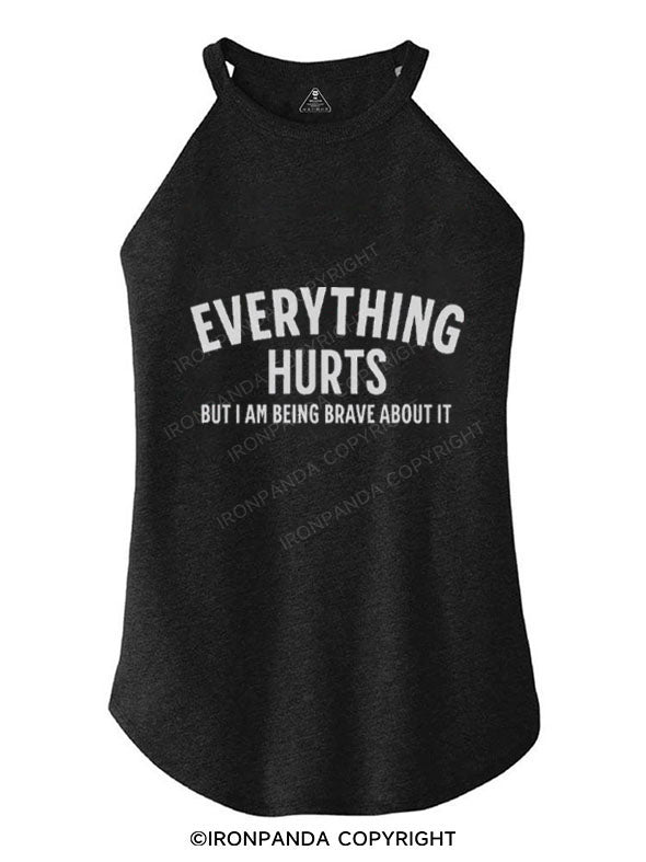 EVERYTHING HURTS BUT I AM BEING BRAVE ABOUT IT TRI ROCKER COTTON TANK