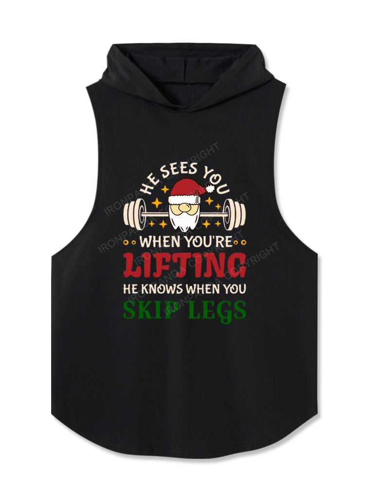 He Sees You When You're Lifting, He Knows When You Skip Legs Hooded Tank