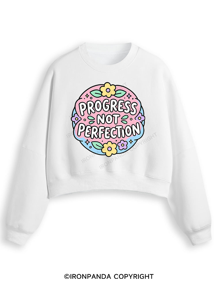 PROGRESS NOT PERFECTION Fleece Crop Sweatshirt