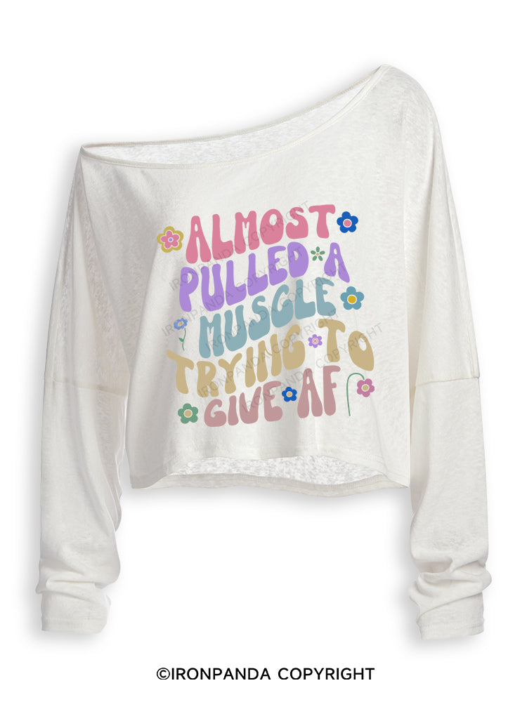 ALMOST PULLED A MUSCLE TRYING TO GIVE AF Off Shoulder Long Sleeve Crop Top