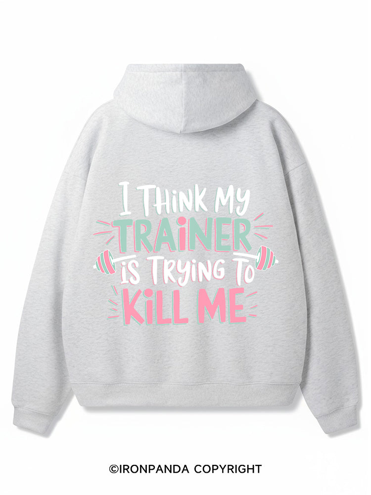 I THINK MY TRAINER IS TRYING TO KILL ME Premium Fleece Gym Hoodie