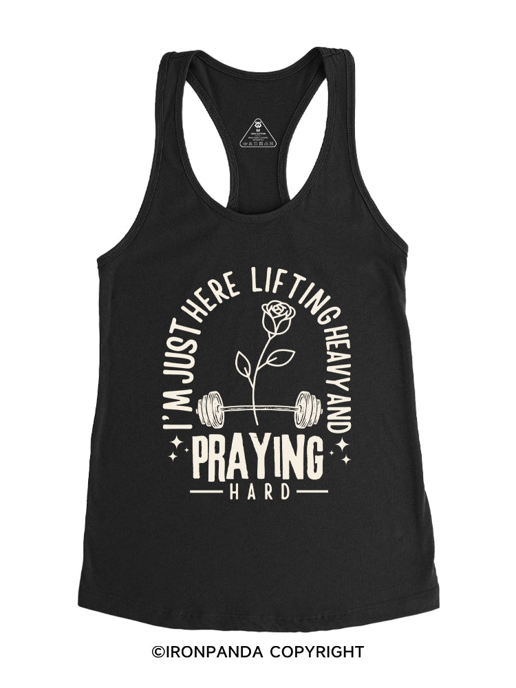 I'M JUST HERE LIFTING HEAVY AND PRAYING HARD Gym Racerback Tank