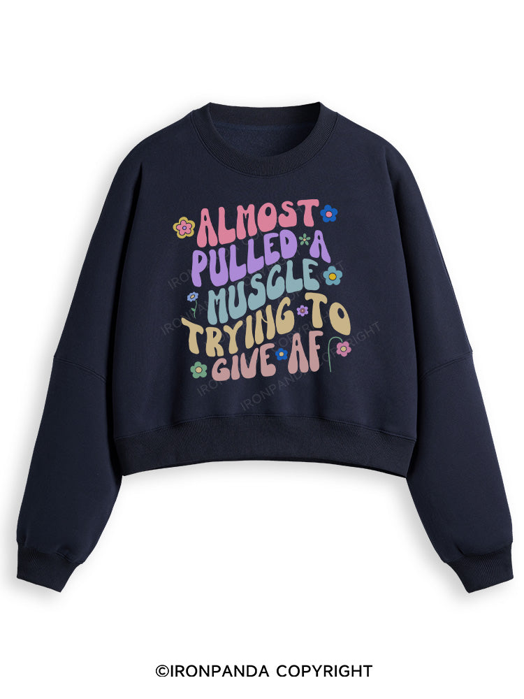 ALMOST PULLED A MUSCLE TRYING TO GIVE AF Fleece Crop Sweatshirt