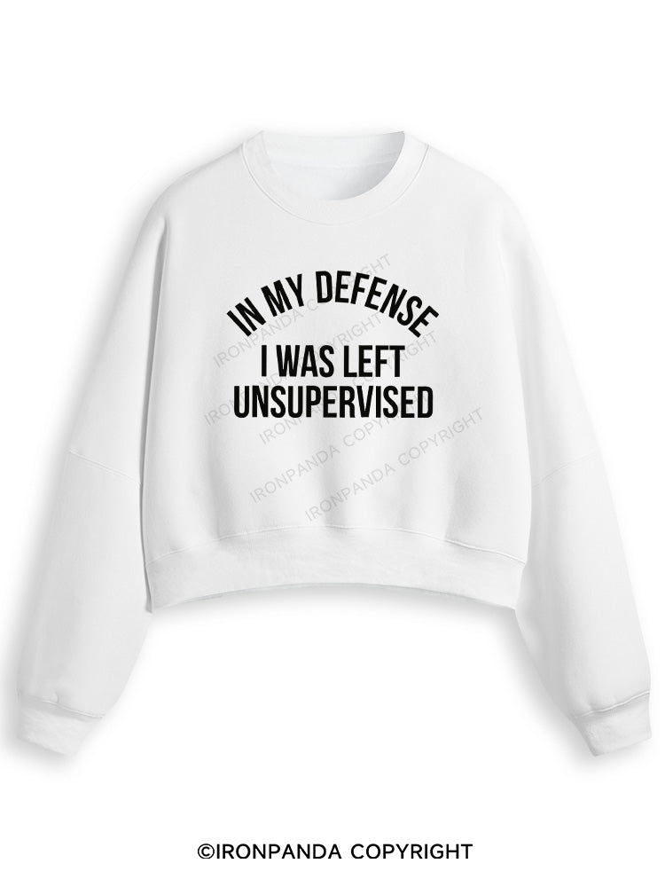 IN MY DEFENSE I WAS LEFT UNSUPERVISED Fleece Crop Sweatshirt