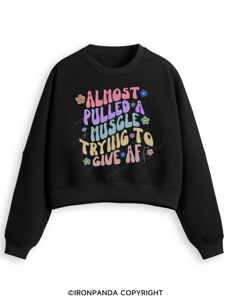 ALMOST PULLED A MUSCLE TRYING TO GIVE AF Fleece Crop Sweatshirt