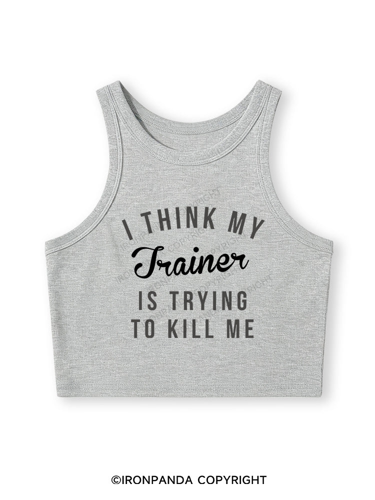 I THINK MY TRAINER IS TRYING TO KILL ME Fitted Crop Tank Top