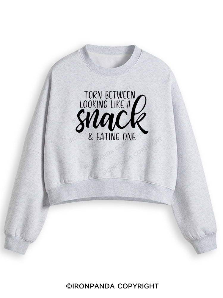 TORN BETWEEN A SNACK AND EAT ONE Fleece Crop Sweatshirt