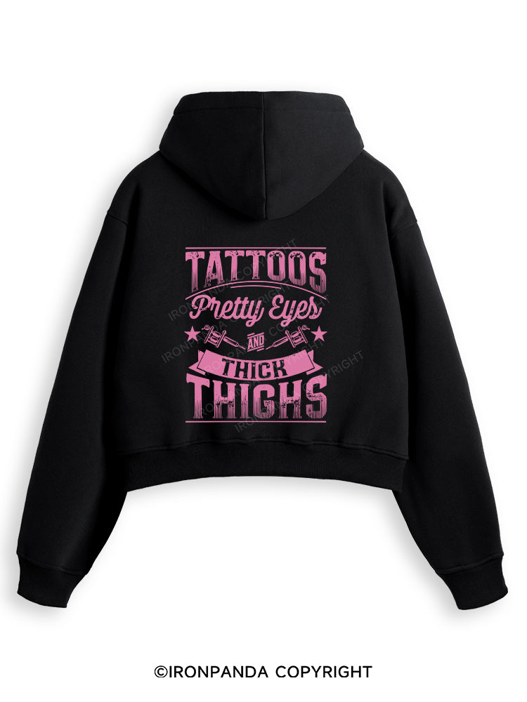 TATTOOS PRETTY EYES AND THICK THIGHS Fleece Crop Zip Up Hoodie