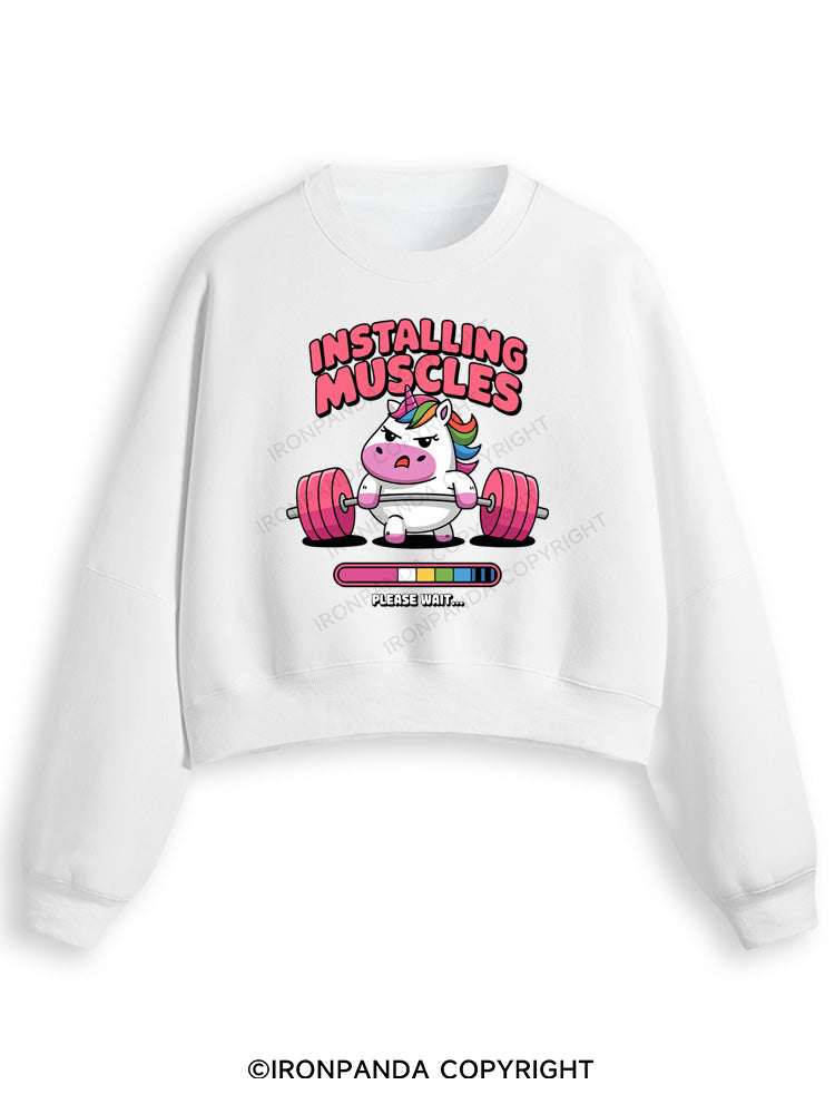 INSTALLING MUSCLES Fleece Crop Sweatshirt