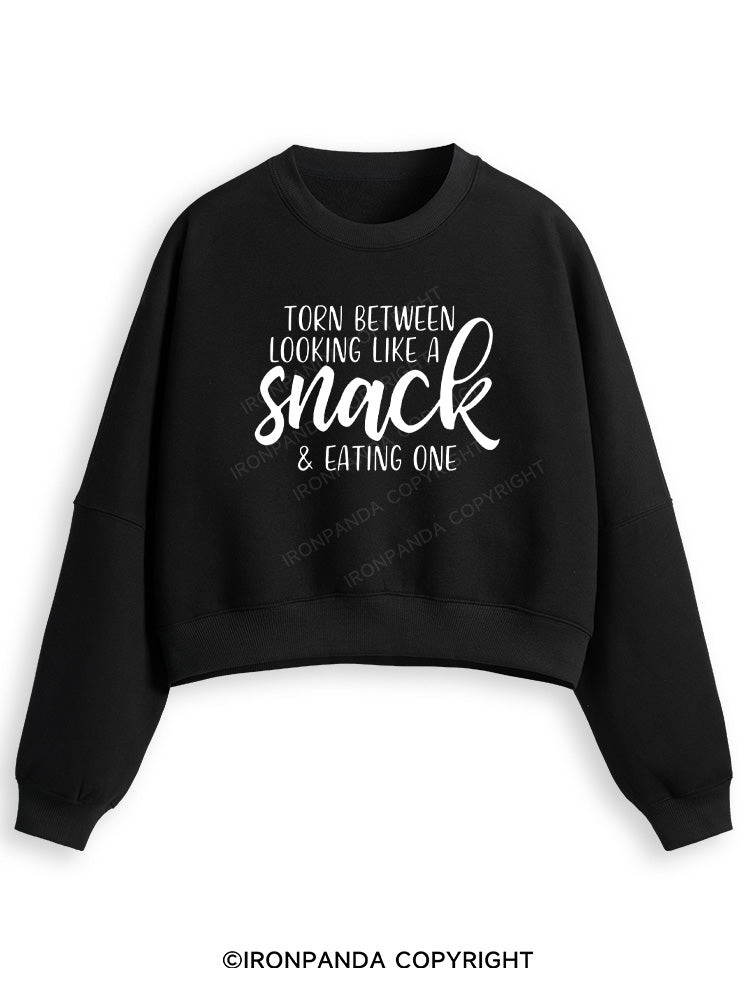 TORN BETWEEN A SNACK AND EAT ONE Fleece Crop Sweatshirt