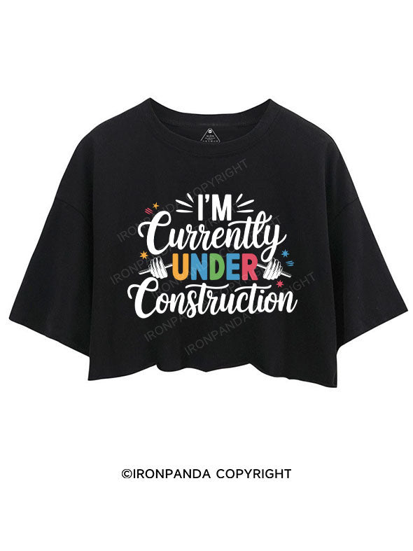 I'M CURRENTLY UNDER CONSTRUCTION CROP TOPS