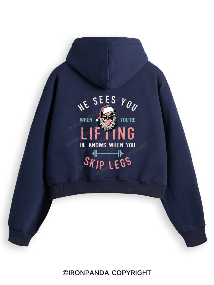 HE SEES YOU WHEN YOU'RE LIFTING Fleece Crop Zip Up Hoodie