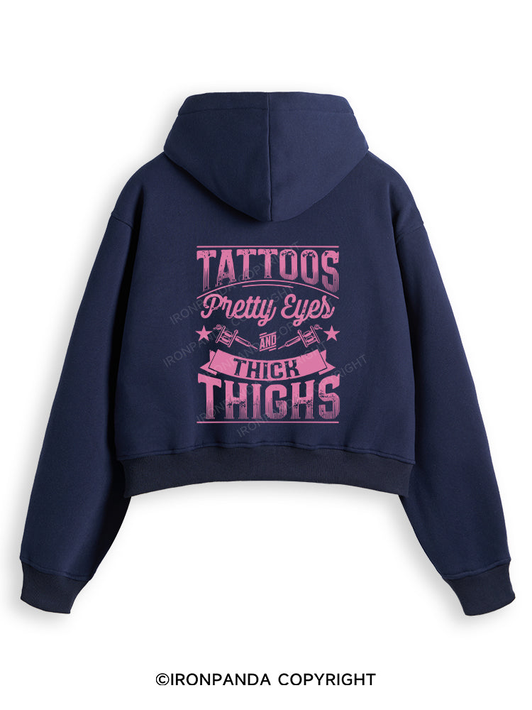 TATTOOS PRETTY EYES AND THICK THIGHS Fleece Crop Zip Up Hoodie