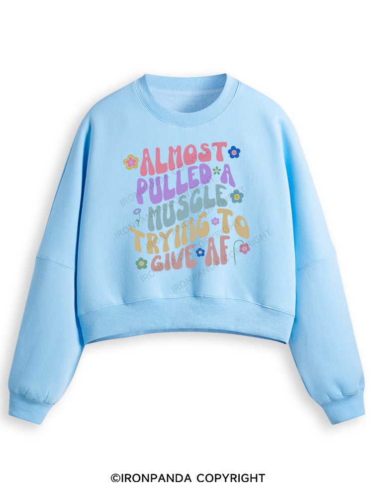 ALMOST PULLED A MUSCLE TRYING TO GIVE AF Fleece Crop Sweatshirt