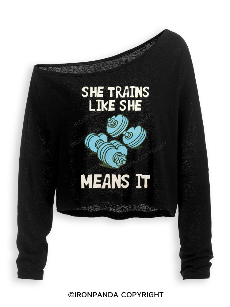 SHE TRAINS LIKE SHE MEANS IT FUNNY GYM Off Shoulder Long Sleeve Crop Top