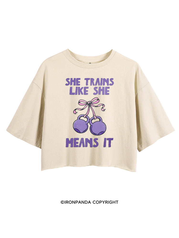 SHE TRAINS LIKE SHE MEANS IT CROP TOPS