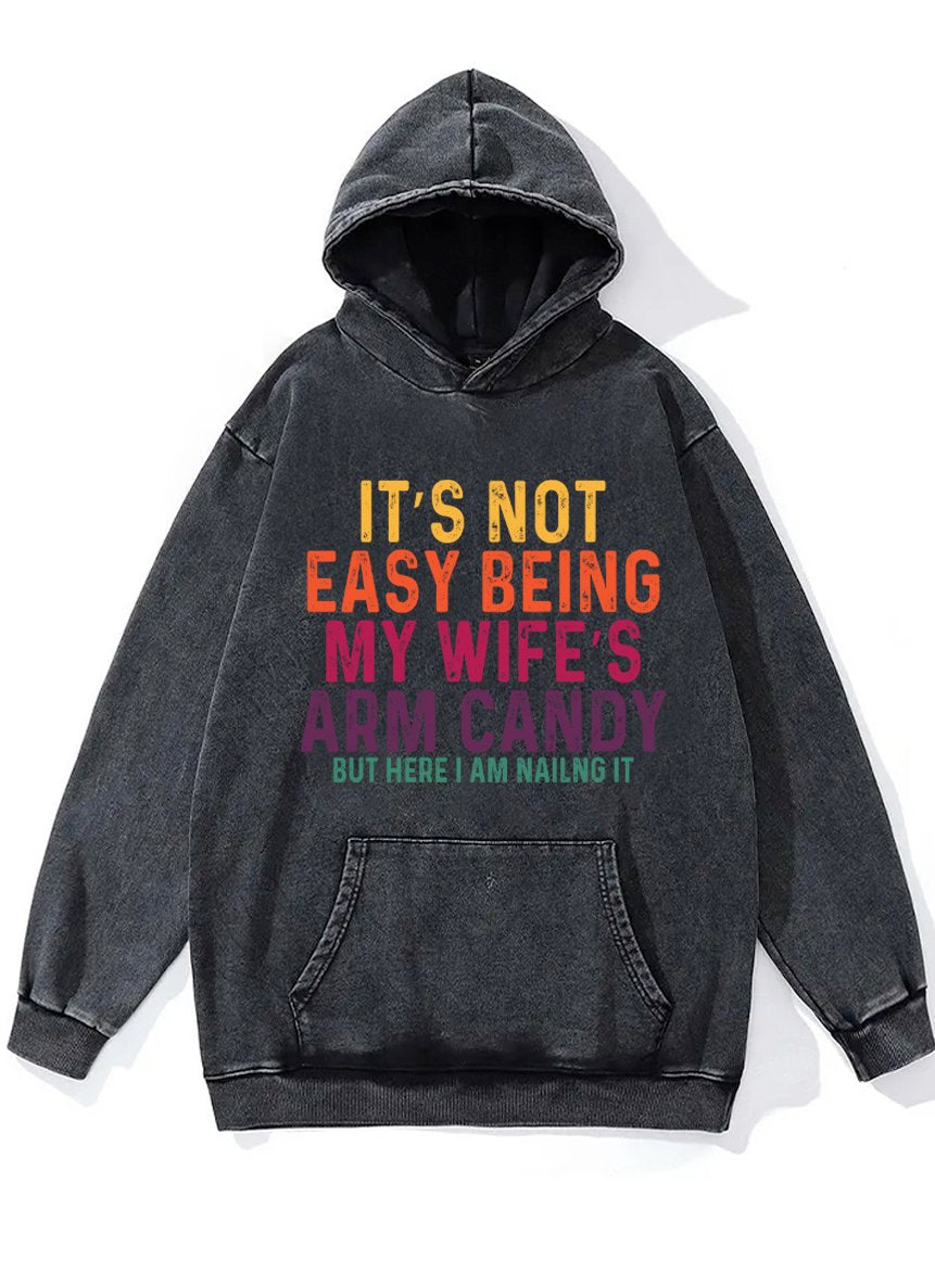 IT'S NOT EASY BEING MY WIFE'S ARM CANDY Washed Gym Hoodie